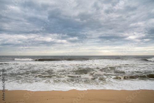 A seashore scene in which high waves come with cloudy weather and strong winds. South Korea Donghae the sea. © JYPIX