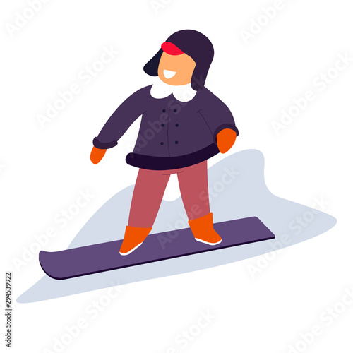 Kid snowboarding down the snowy slope during winter holidays