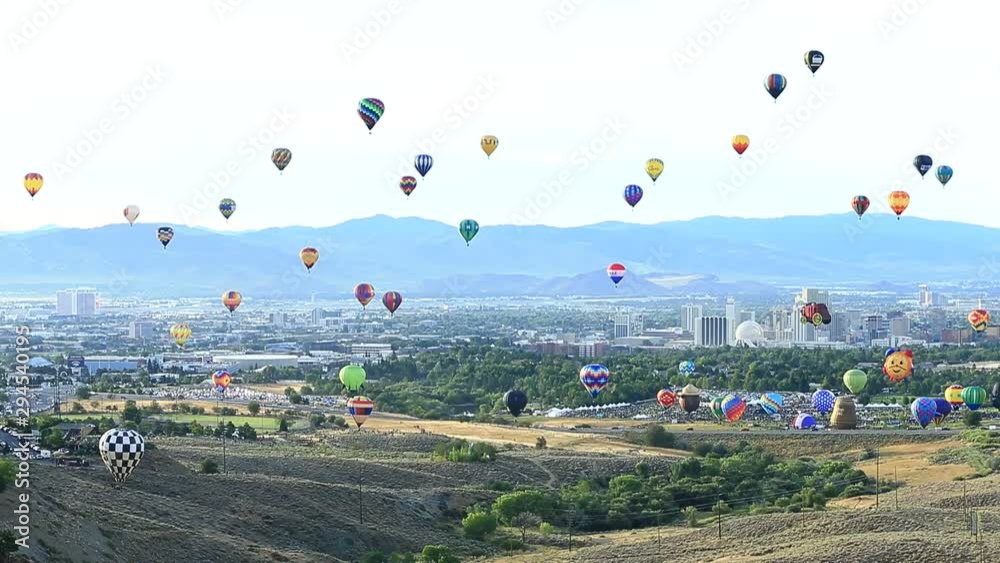 Wide Angle Pan of the Great Reno Balloon Races with City Skyline.