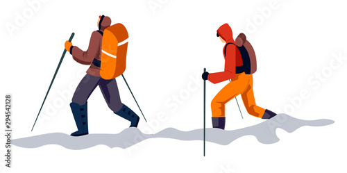 Mountain hiking group with backpacks and trekking poles