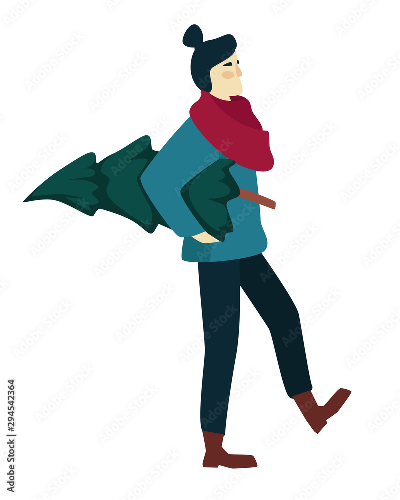 Woman shopping and carrying Christmas tree in winter