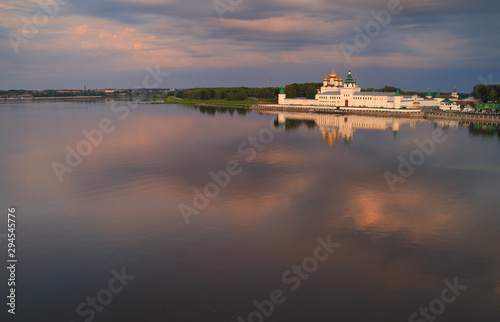 Holy Trinity Ipatiev Monastery at dawn, view from the bridge over the Kostroma river on a summer morning. City of Kostroma.Gold ring of Russia.