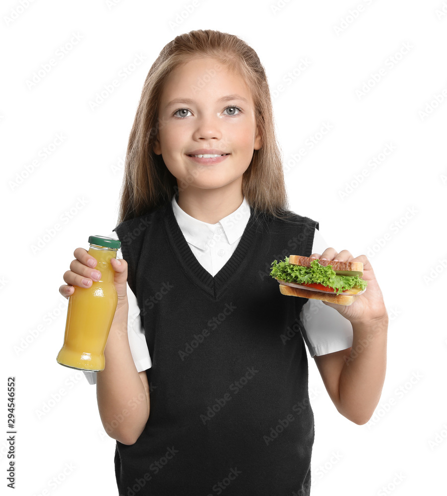 Happy girl holding sandwich and bottle of juice on white background. Healthy food for school lunch