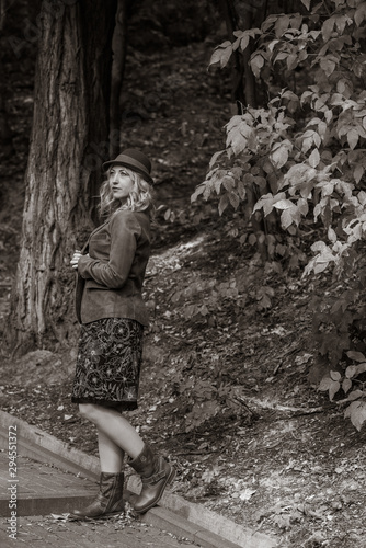 Woman at autumn in fashionable clothes  vogue concept