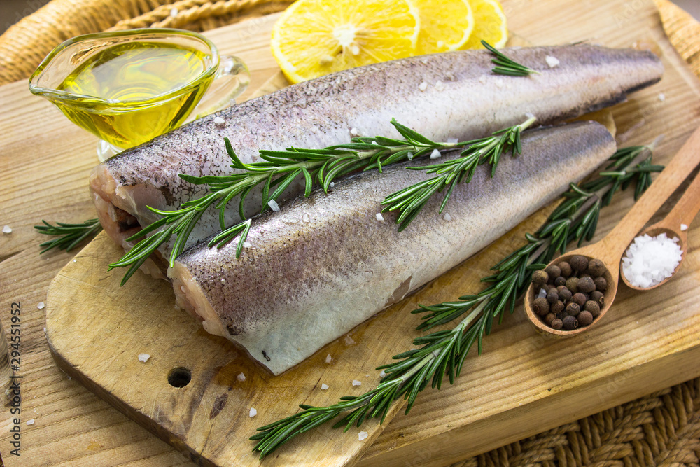 Save Download Preview Fresh raw carcass of hake, greenery and lemon . Ingredients for a fish dish Save Download Preview Fresh raw carcass of hake, greenery and lemon . Ingredients for a fish dish