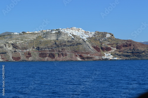 Red rock mountain and the blue ocean view. Greece photo