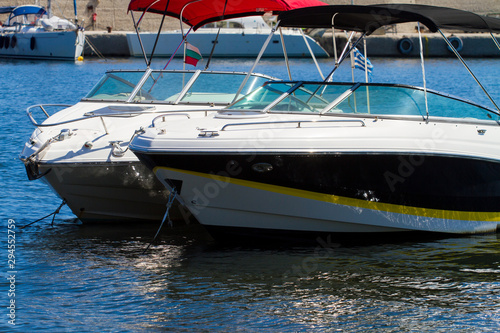 part of the motorboat in the marina, summer day © ctvvelve