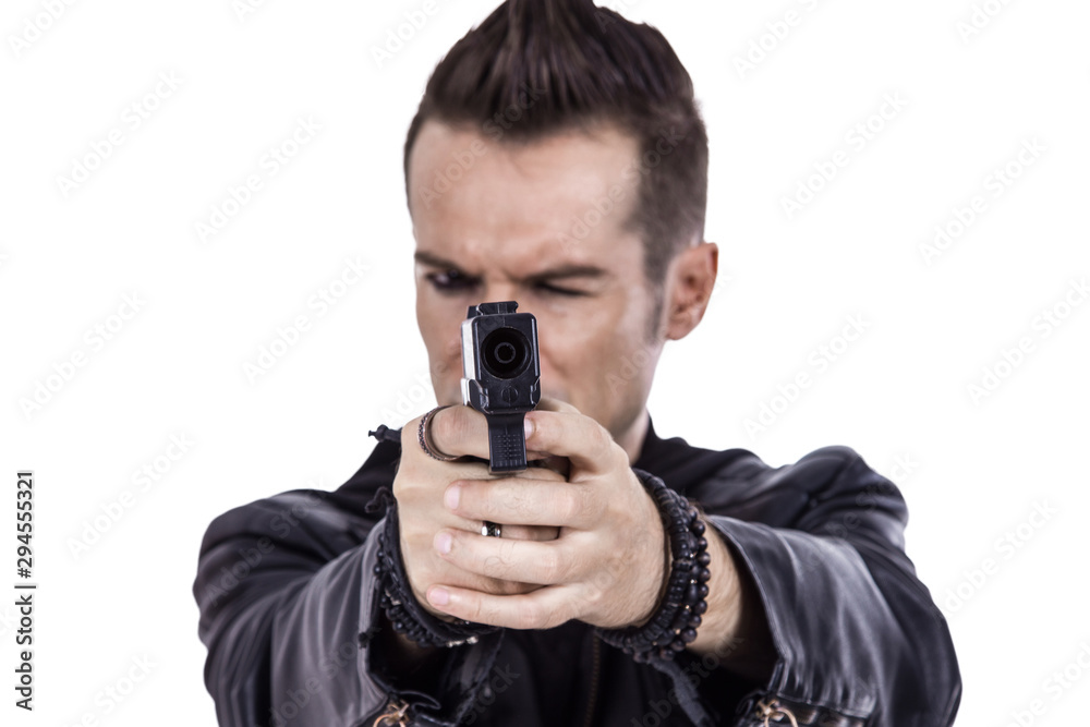 Close-up of man with handgun. Close-up of man with handgun.