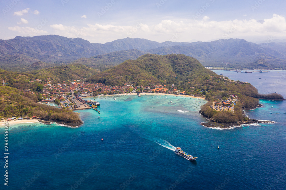 Roro car ferry leaving the Padang Bai harbor in Bali in Indonesia heading to Lombok island