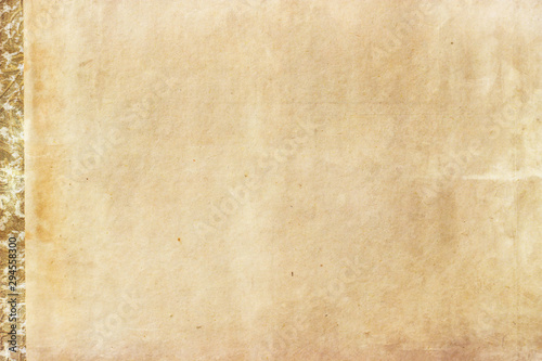 Aged blank paper with wrinkles and stains; vintage paper background 
