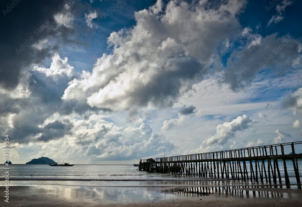Pier for ferry boats at the airport beach, El Nido, Palawan, Philippines Pier for ferry boats at the airport beach, El Nido, Palawan, Philippines