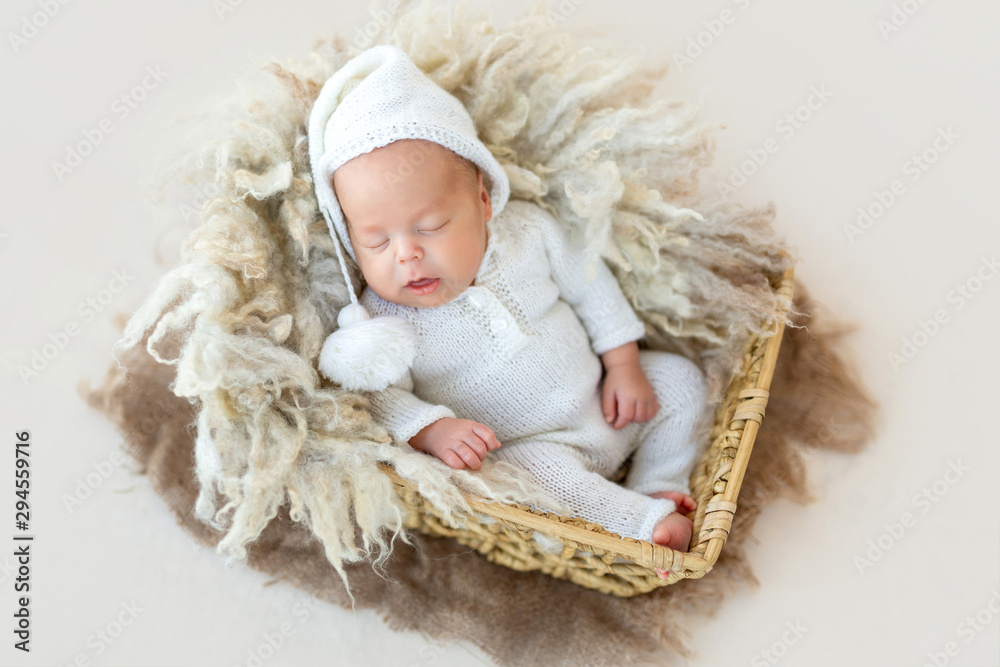 Lovely newborn in basket