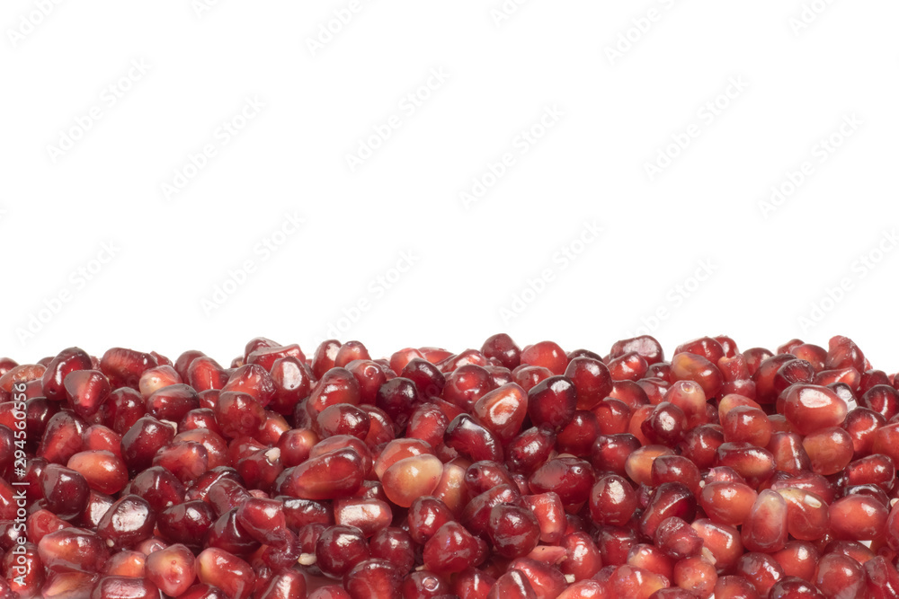 ripe pomegranate berries on a white background ripe pomegranate berries on a white background