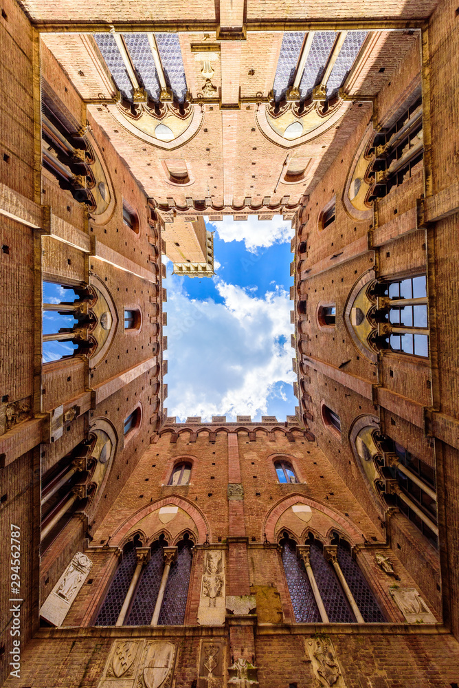 Siena - View from inside the Palazzo Pubblico at Piazza del Campo - old historic city in Italy