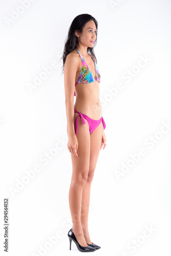 Full body shot of beautiful Asian woman wearing bikini © Ranta Images