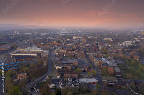 Dudley town centre at sunrise with pink clouds and quiet streets aerial © UAV4