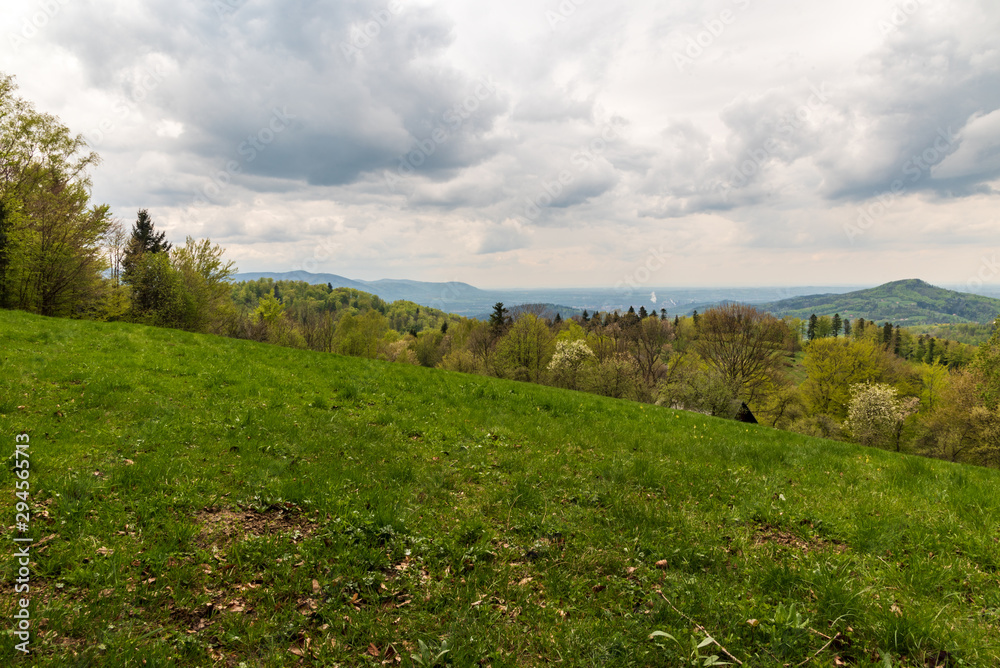 view from meadow bellow Velka Cantoryje hill in springtime Slezske Beskydy on czech - polish borders view from meadow bellow Velka Cantoryje hill in springtime Slezske Beskydy on czech - polish borders