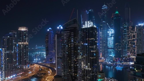 Wallpaper Mural Aerial panoramic view of Dubai Marina residential and office skyscrapers with waterfront night view. Traffic on streets Torontodigital.ca