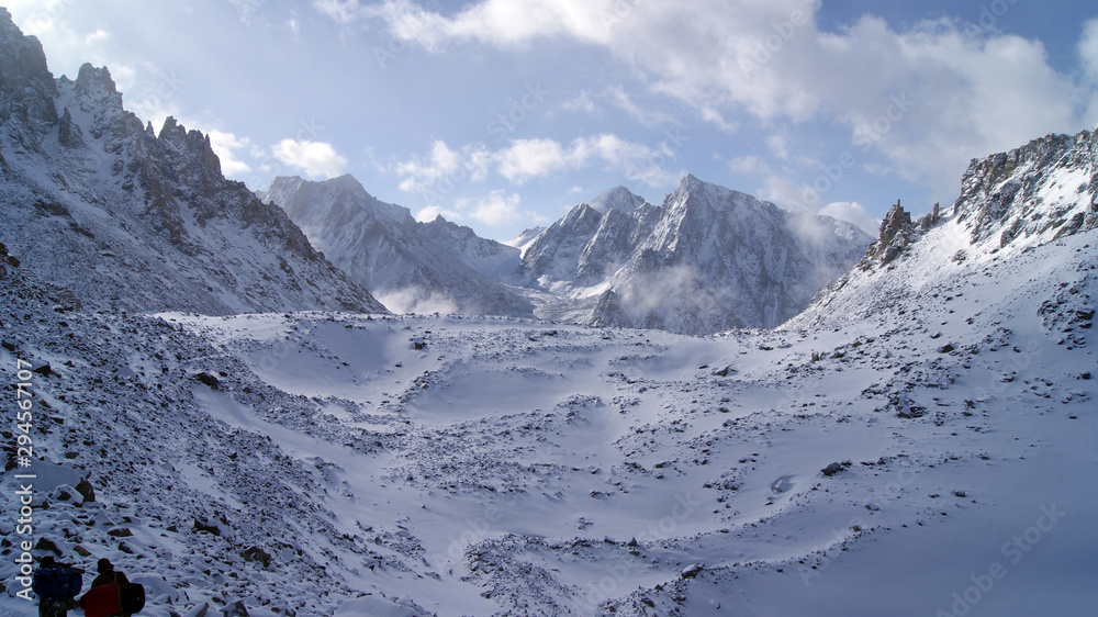 view of the snowy mountains near Kailash in the Himalayas view of the snowy mountains near Kailash in the Himalayas