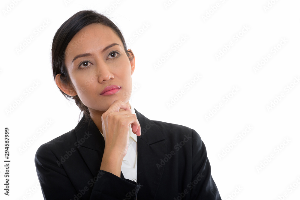 Studio shot of young beautiful Asian businesswoman Studio shot of young beautiful Asian businesswoman