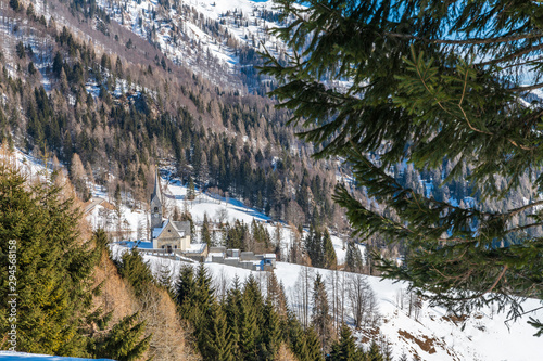 Winter magic. The ancient wooden houses of Sauris di Sopra. Italy photo