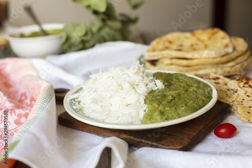 Traditional indian food with rice and pita