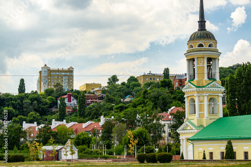 Voronezh, Russia, June 11, 2019. View of Assumption Church of Admiralty on Admiralteyskaya Square. Domes are crowned with golden crosses. Oldest preserved church in Voronezh. Place for text. photo