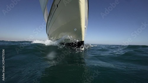 Sailboat prow sailing closeup in super slow motion, loopable photo