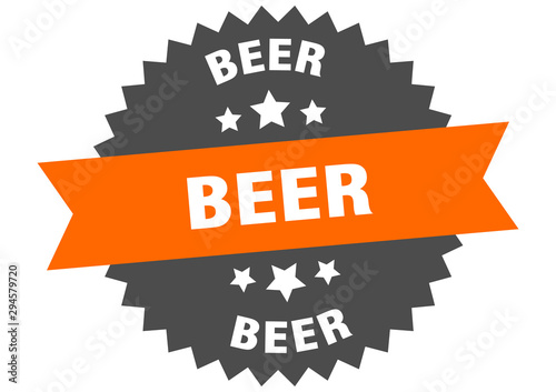 beer sign. beer orange-black circular band label