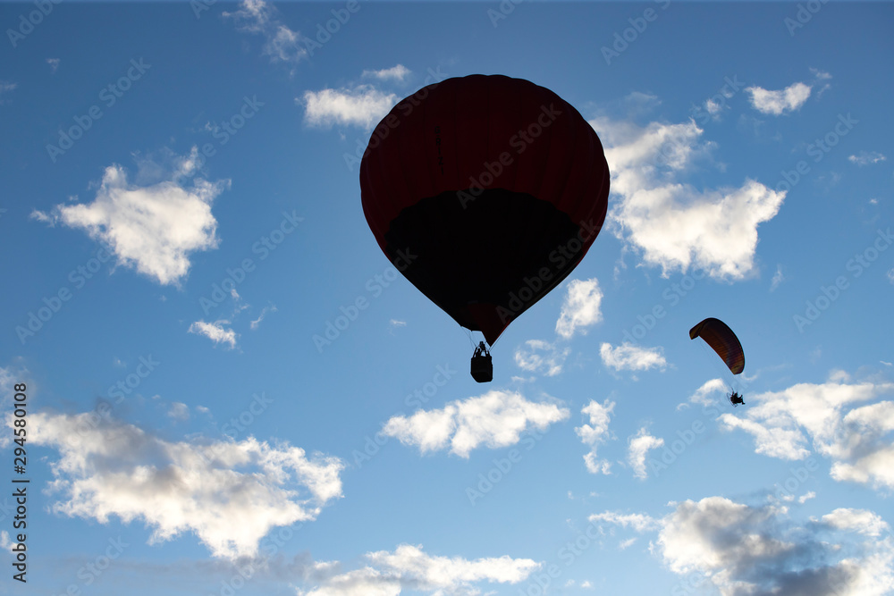 Fototapeta premium Hot air balloon over blue sky.