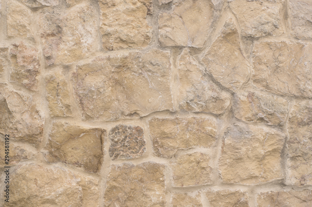 Old stone wall light brown background Old stone wall light brown background
