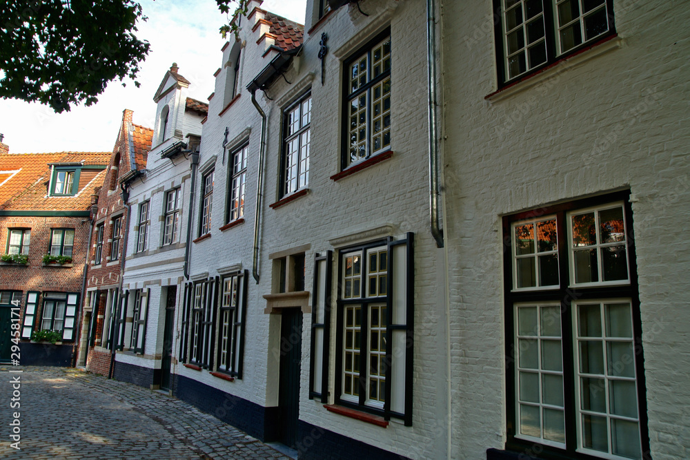 Traditional Brugge houses views. architecture of Bruges city, traditional narrow streets, Belgium