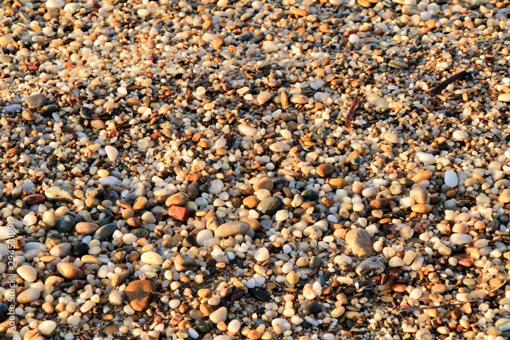 Rock textures, boulders and waves on the shore in Cartagena, Spain