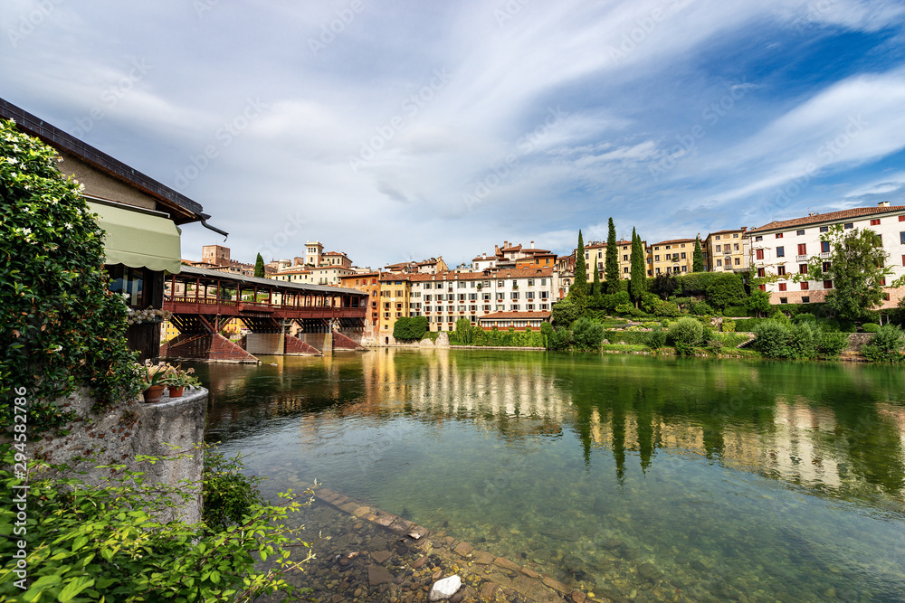 Bassano del Grappa with the river Brenta and the Ponte degli Alpini (Bridge of the Alpini). Vicenza province, Veneto, Italy, Europe