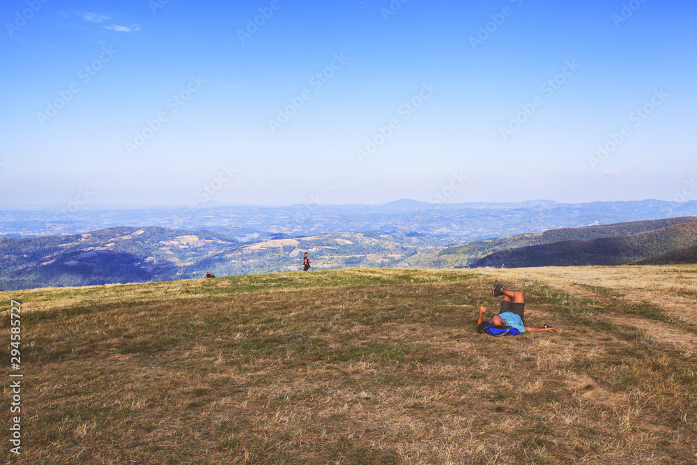 Hiker man relaxing after walking