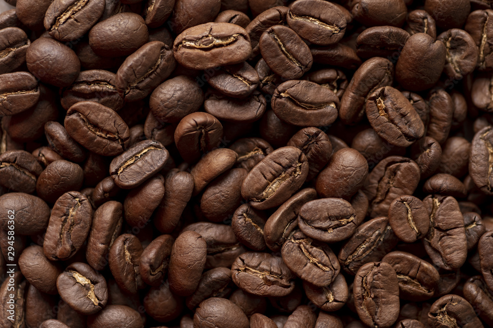 Fototapeta premium Background of tasty roasted coffee beans