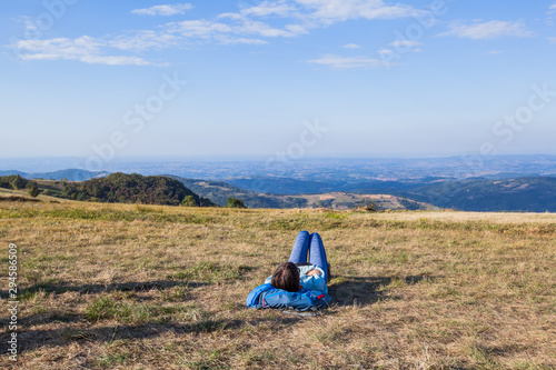 Hiker woman relaxing after walking
