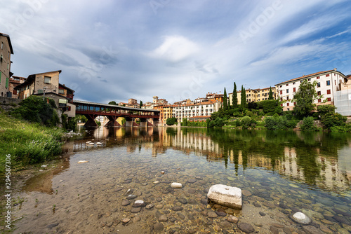 Bassano del Grappa with the river Brenta and the Ponte degli Alpini (Bridge of the Alpini). Vicenza province, Veneto, Italy, Europe