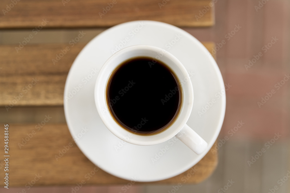 Minimalist cup of coffee top view Minimalist cup of coffee top view