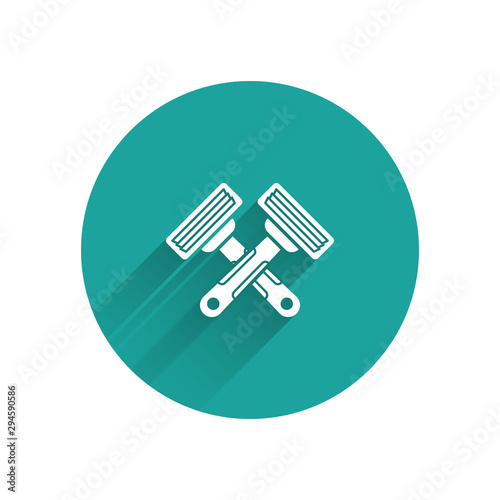 White Crossed shaving razor icon isolated with long shadow. Green circle button. Vector Illustration