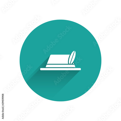 White Oktoberfest hat icon isolated with long shadow. Hunter hat with feather. German hat. Green circle button. Vector Illustration