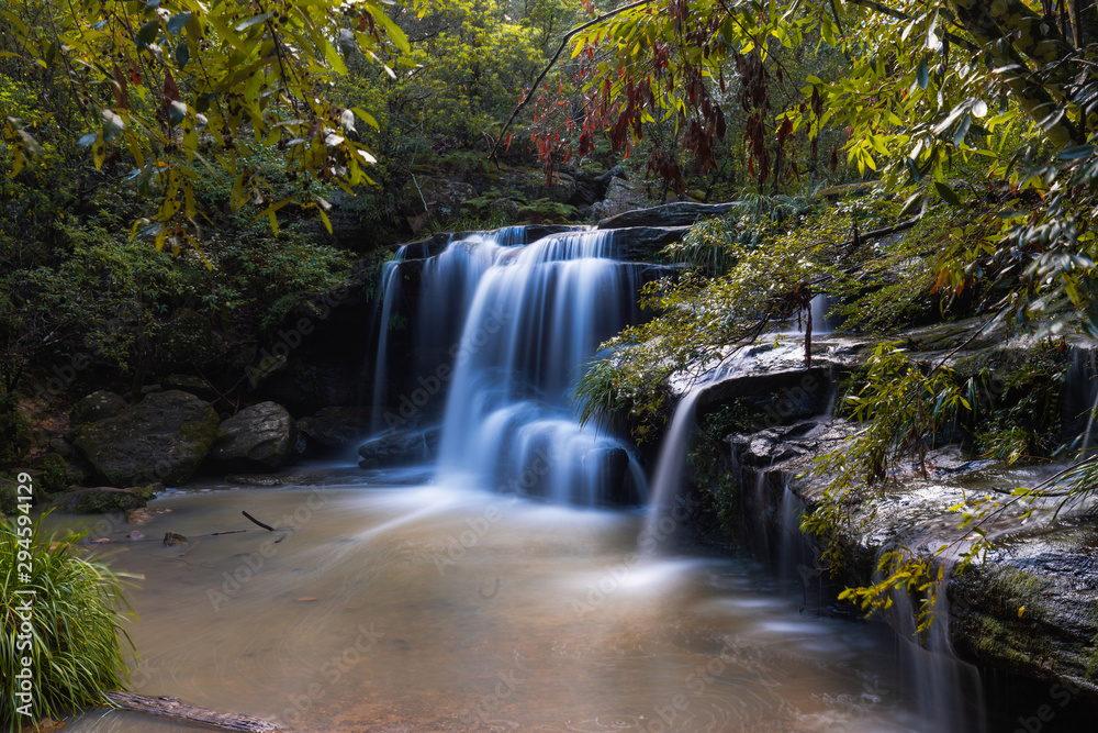 Waterfall view in the middle of forest. Waterfall view in the middle of forest.