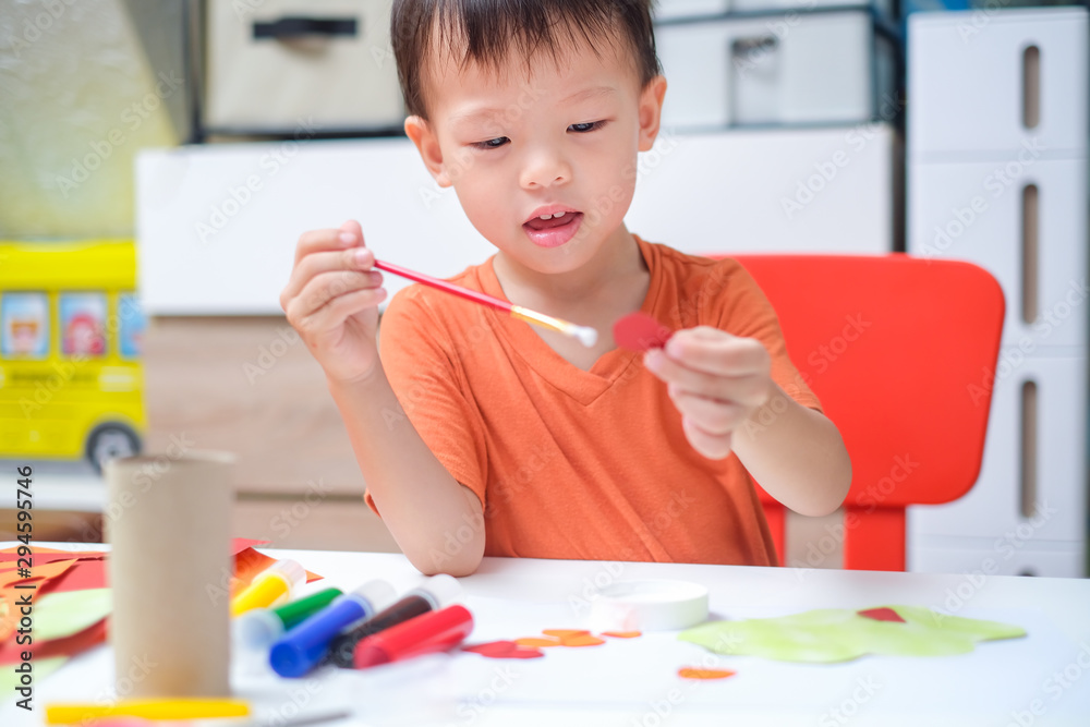 Cute little Asian 3 years old toddler boy enjoy using glue doing arts at home, Fun paper and glue crafts for toddlers, Children's Art Project, DIY Toys for kids from Recyclable Materials concept Cute little Asian 3 years old toddler boy enjoy using glue doing arts at home, Fun paper and glue crafts for toddlers, Children's Art Project, DIY Toys for kids from Recyclable Materials concept