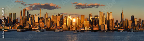 New York City sunset on Midtown West and its skyscrapers. Panoramic view on Manhattan and the Hudson River banks