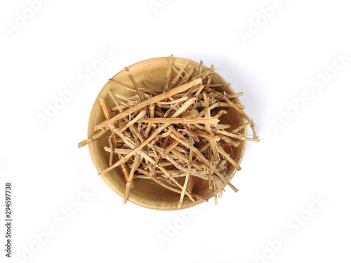 Dried Cogon grass root / Imperata cylindrica (commonly known as akar alang alang in Indonesia) on white background. Traditional medicine herb for alternative Health therapy hypertension, asthma, etc photo