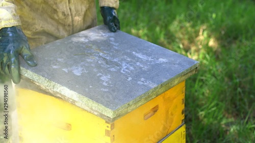 Beekeepers with Beehive, honey and bees
