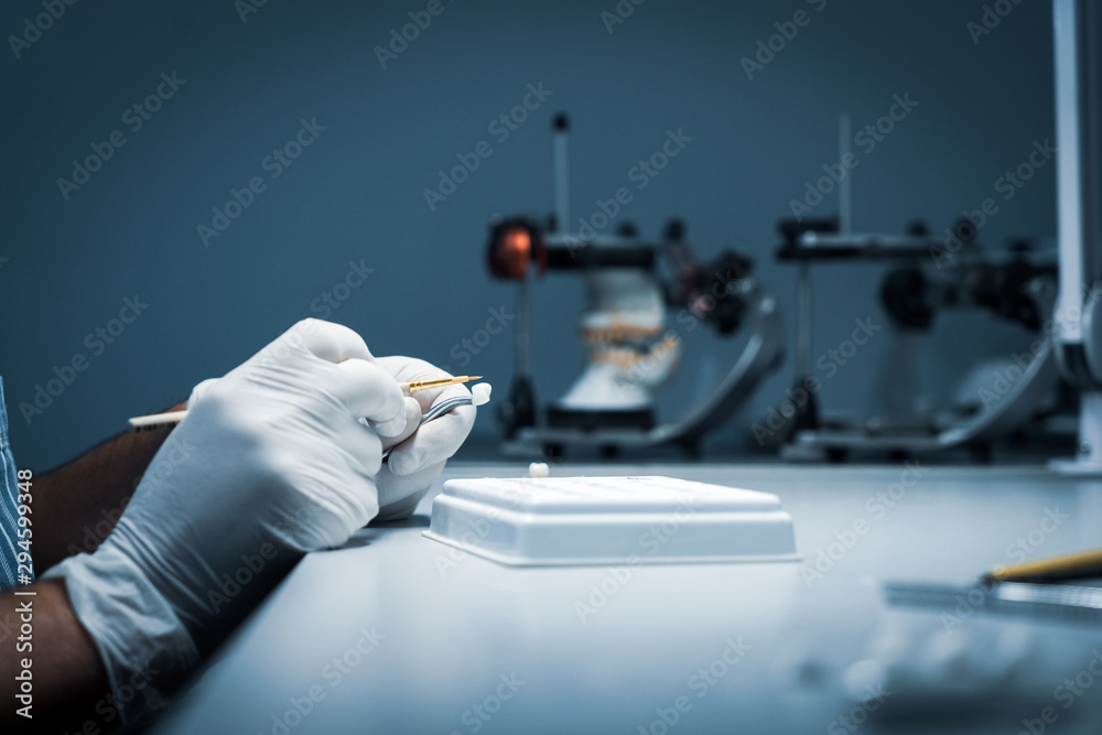 processing and correction of the dental crown. laboratory Stock Photo