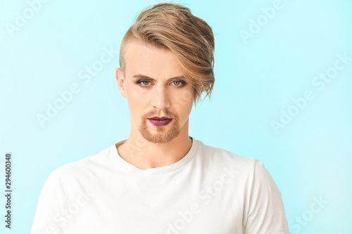 Portrait of young transgend...