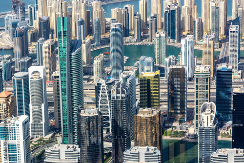 Photography Aerial view of Dubai Marina skyline, close up on buildings from above, United Ar