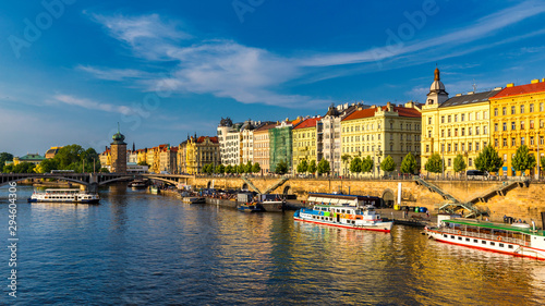 Scenic embankment in Prague city; Historical center of Prague, buildings and landmarks of old town, Prague, Czech Republic. Embankment of the Vltava river in Prague, the capital of Czechia.